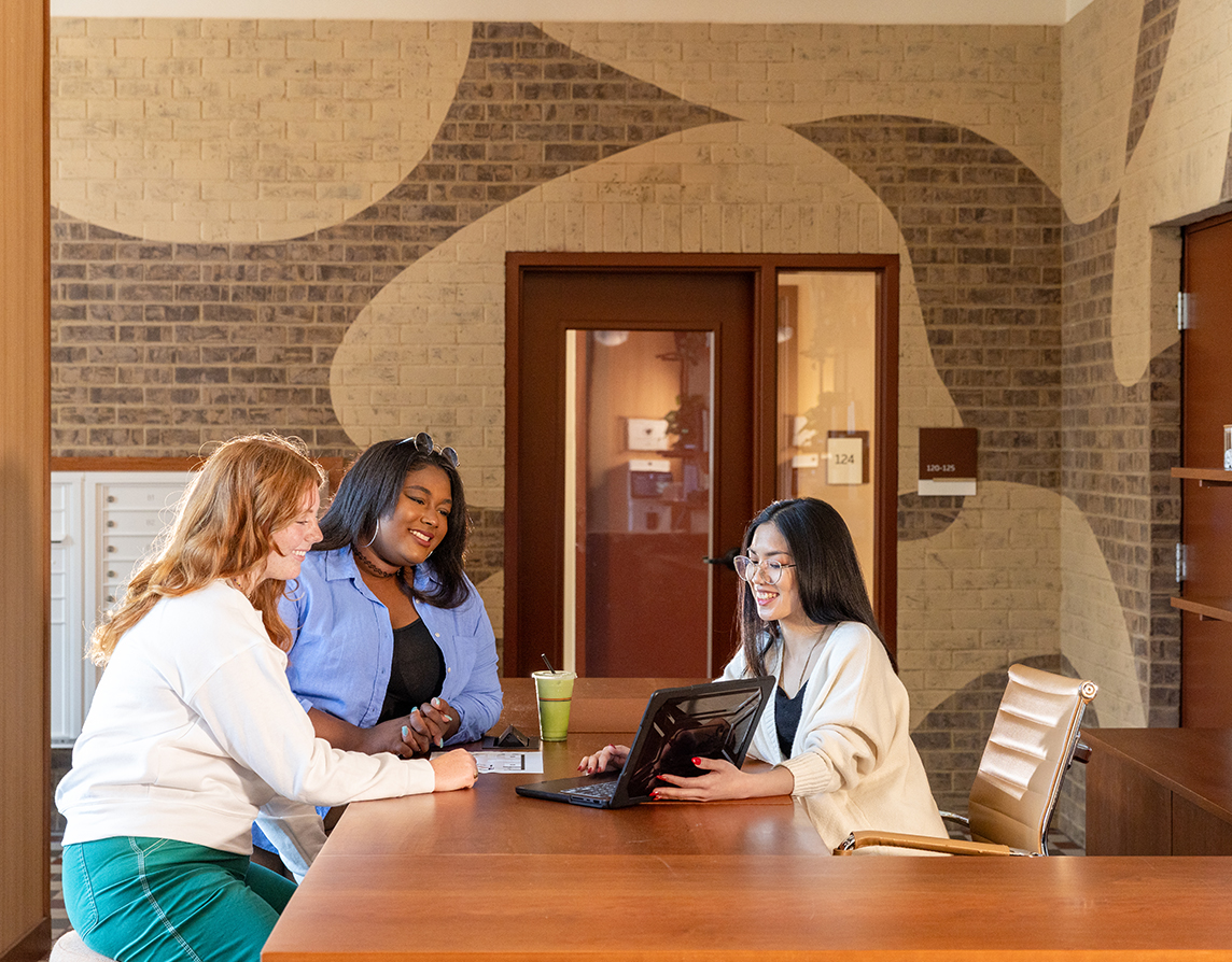 group of young women studying